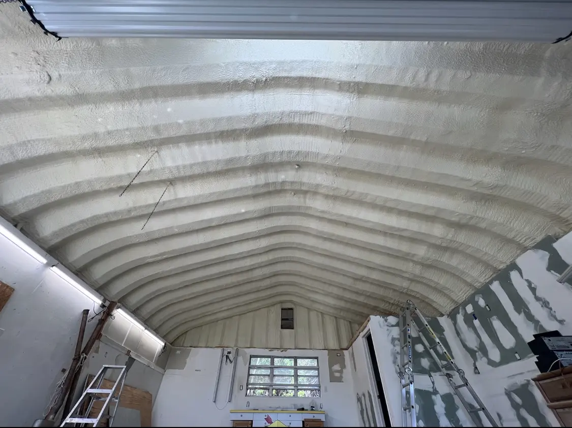 Spray polyurethane foam applied to the underside of a metal roof deck in Palm Springs North